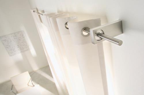 gordijnen ingeslagen ringen aan roede